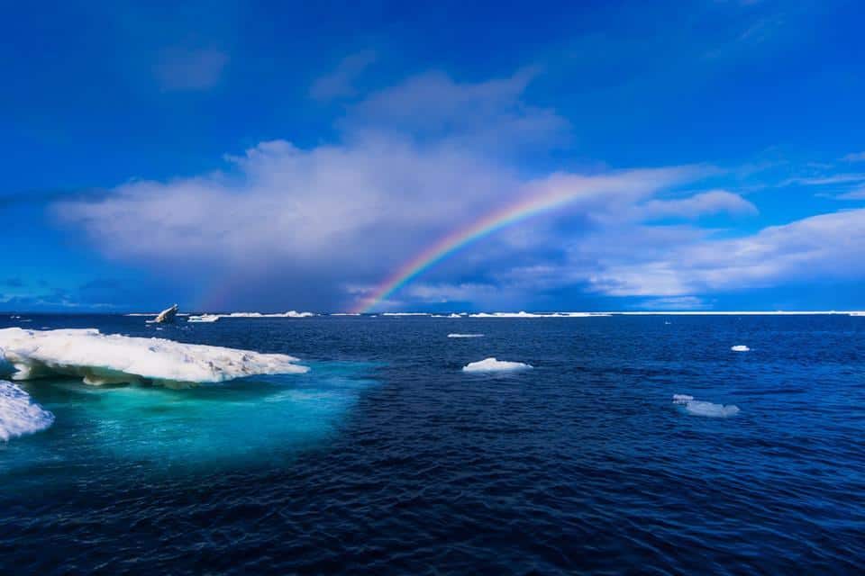 Rainbow over Arctic waters